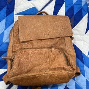 Embossed leather backpack